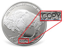 COPY on a silver round